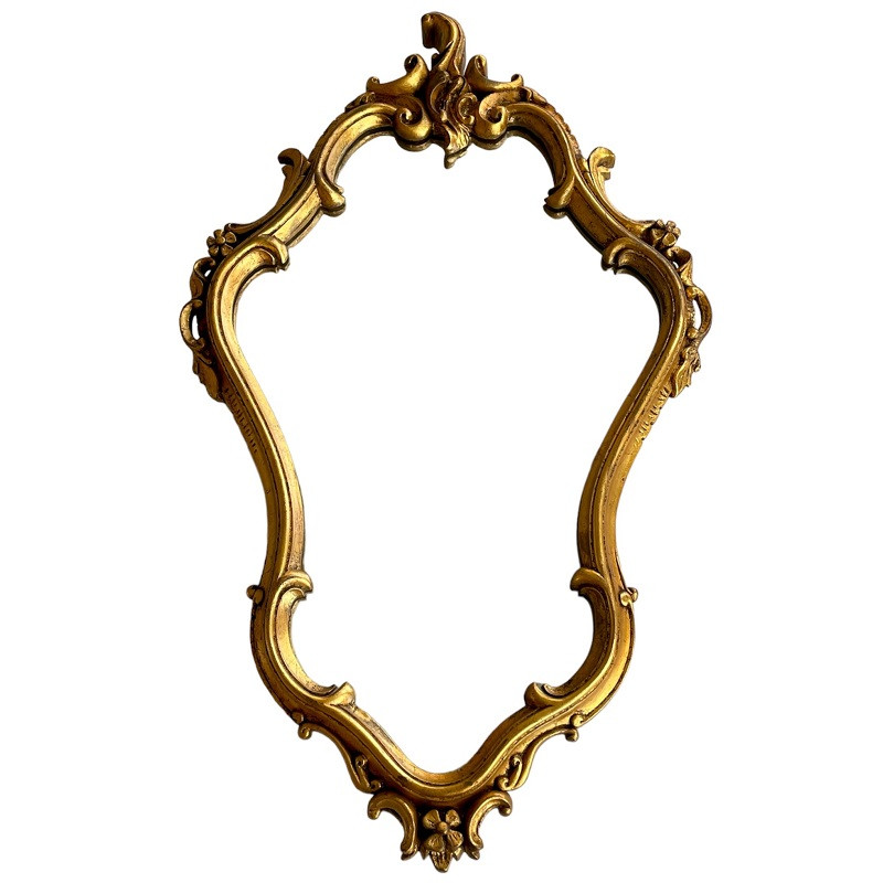 Miroir doré cadre à moulures style baroque