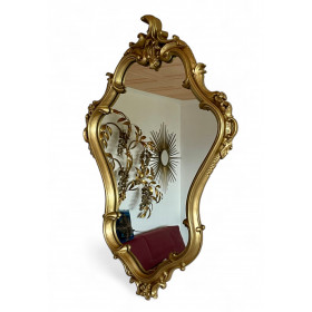 Miroir doré cadre à moulures style baroque