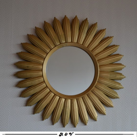 Miroir soleil doré en résine 1970